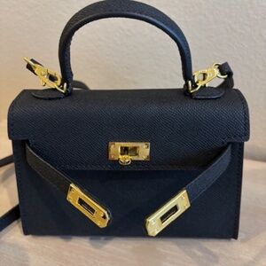 Cute black crossbody with gold hardware